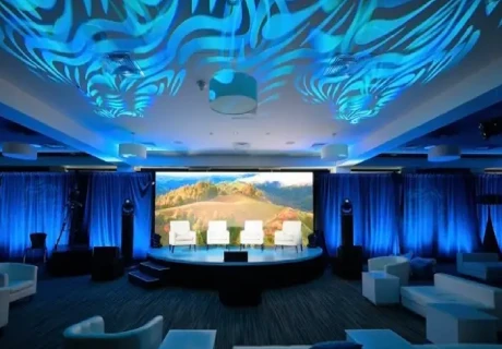 A projector shines light during an event supported by SoFlo Main Event Productions video in Hialeah, FL.