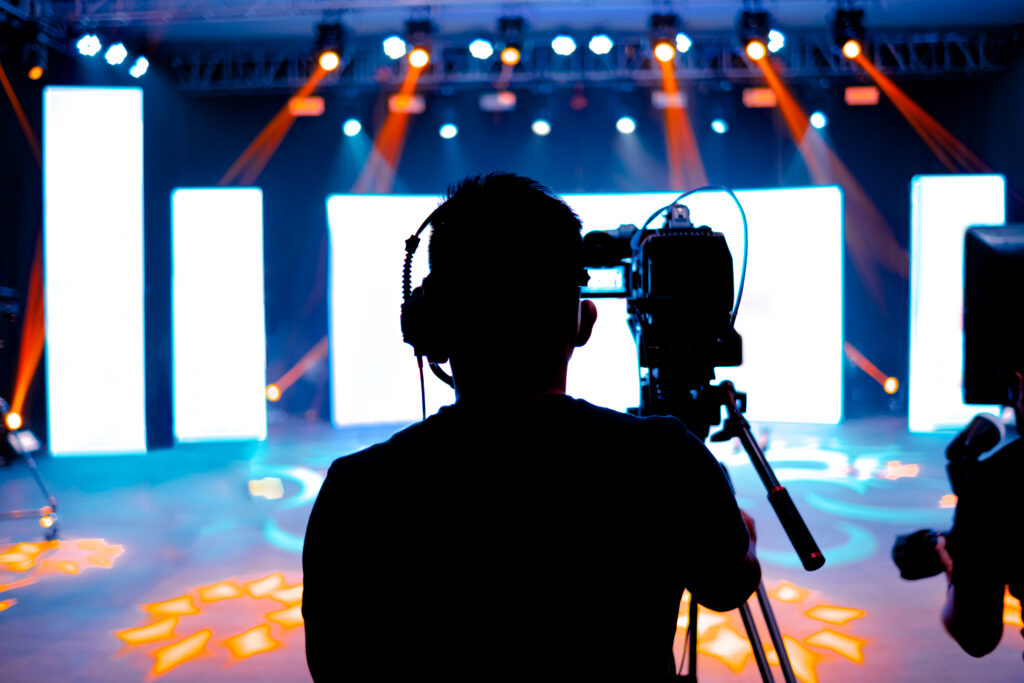 professional,cameraman, ,covering,on,event,with,a,video,,cameraman